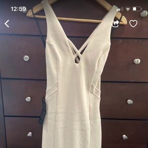 Beige bodycon Bebe midi dress